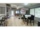 Open-concept living room with tile flooring and a dining area adjacent to the kitchen at 16836 E Mirage Crossing Ct # B, Fountain Hills, AZ 85268