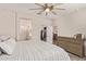 Spacious bedroom featuring a large closet, dresser, and an airy feel at 17431 W Via De Luna Dr, Surprise, AZ 85387