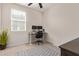 Bedroom featuring carpet, a ceiling fan, and a desk with two monitors at 17431 W Via De Luna Dr, Surprise, AZ 85387