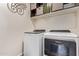 Laundry room showcasing modern washer and dryer at 17431 W Via De Luna Dr, Surprise, AZ 85387