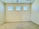 Bedroom with neutral carpet, recessed lighting, and window with blinds at 17477 W Woodrow Ln, Surprise, AZ 85388