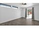 Bright bedroom with recessed lights, modern ceiling fan, and a sliding glass door to the backyard at 1811 E Aurelius Ave, Phoenix, AZ 85020