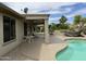 Wonderful back patio with pool, spa, and bbq, an outdoor oasis at 19058 N Aztec Point Dr, Surprise, AZ 85387