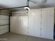 Spacious garage with large storage cabinets and easy access at 19058 N Aztec Point Dr, Surprise, AZ 85387