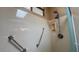 Shower features dual shower heads and convenient grab bars for accessibility at 19058 N Aztec Point Dr, Surprise, AZ 85387