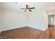 Spacious bedroom showcasing a ceiling fan, new wood floors and an open layout at 2021 W Clarendon Ave, Phoenix, AZ 85015
