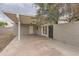 Carport with access to both the house and the backyard at 2021 W Clarendon Ave, Phoenix, AZ 85015