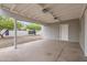Open carport offering parking and backyard access at 2021 W Clarendon Ave, Phoenix, AZ 85015