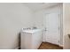 Spacious laundry room with modern washer and dryer at 2021 W Clarendon Ave, Phoenix, AZ 85015