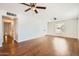 Bright living room featuring hardwood floors and neutral paint at 2021 W Clarendon Ave, Phoenix, AZ 85015