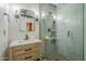 Stylish bathroom with modern vanity, glass enclosed shower and industrial-style fixtures at 21 E 6Th St # 311, Tempe, AZ 85281