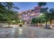 Brick apartment building surrounded by trees and lighted sidewalks at 21 E 6Th St # 311, Tempe, AZ 85281