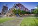 Modern building with manicured lawns and sidewalks near construction in a vibrant, urban setting at 21 E 6Th St # 311, Tempe, AZ 85281