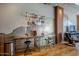 Kitchen featuring stainless steel counter and backsplash, bar stools and exposed ductwork at 21 E 6Th St # 311, Tempe, AZ 85281