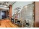 Modern kitchen with stainless steel counter and backsplash, bar stools and exposed ductwork at 21 E 6Th St # 311, Tempe, AZ 85281