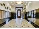 Elegant building lobby with tiled floors, mailboxes, and ornamental plants at 21 E 6Th St # 311, Tempe, AZ 85281