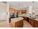 Beautiful kitchen with granite countertops, stainless steel appliances, and stylish backsplash at 22318 N Pico Ct, Sun City West, AZ 85375