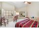 Bright bedroom with ample natural light, complemented by stylish furnishings and serene ambiance at 25150 N Windy Walk Dr # 37, Scottsdale, AZ 85255