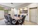 Well-lit conference room with large wood table, leather chairs, and modern design elements at 25150 N Windy Walk Dr # 37, Scottsdale, AZ 85255
