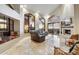 Bright living room with high ceilings, large windows and fireplace at 25150 N Windy Walk Dr # 37, Scottsdale, AZ 85255