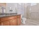 Bathroom featuring a glass shower enclosure and a granite vanity at 28623 N 66Th Ave, Phoenix, AZ 85083