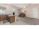 The kitchen features ample countertop space that overlooks a spacious room with neutral colors at 28623 N 66Th Ave, Phoenix, AZ 85083