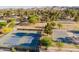 View of a Community Park offering amenities with tennis and basketball courts on well-maintained grounds and landscaping at 302 E Acapulco Ln, Phoenix, AZ 85022