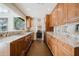Kitchen featuring stainless steel appliances, granite countertops, and ample cabinet space at 302 E Acapulco Ln, Phoenix, AZ 85022