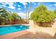 Refreshing pool with desert landscaping and hardscape at 302 E Acapulco Ln, Phoenix, AZ 85022