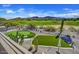 Expansive backyard featuring a putting green and lush landscaping with views at 3601 N Sonoran Hts, Mesa, AZ 85207