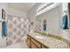 Well-lit bathroom with modern fixtures and a stylish shower curtain at 3601 N Sonoran Hts, Mesa, AZ 85207