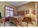 Comfortable bedroom featuring warm colors, natural light, and stylish furnishings at 3601 N Sonoran Hts, Mesa, AZ 85207