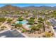 Beautiful community pools and gazebo area with mature landscaping at 3601 N Sonoran Hts, Mesa, AZ 85207