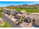 Beautiful home with desert landscaping, a three-car garage, and a well-maintained front yard near a golf course at 3601 N Sonoran Hts, Mesa, AZ 85207