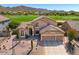 Charming two-story home featuring a three-car garage, desert landscaping, and picturesque mountain views at 3601 N Sonoran Hts, Mesa, AZ 85207