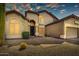 Charming home with desert landscaping including cacti, plus a three-car garage at 3601 N Sonoran Hts, Mesa, AZ 85207