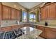 Well-equipped kitchen with granite counters, updated appliances, and ample cabinet space at 3601 N Sonoran Hts, Mesa, AZ 85207
