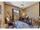 Comfortable office space with natural light, a ceiling fan, and stylish decor at 3601 N Sonoran Hts, Mesa, AZ 85207