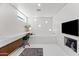 Bright bathroom offers a built-in soaking tub, sleek vanity, and modern lighting fixtures at 3710 E Hazelwood St, Phoenix, AZ 85018