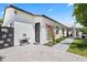 Well-maintained home exterior boasting a modern design, tasteful landscaping, and a clean, inviting aesthetic at 3710 E Hazelwood St, Phoenix, AZ 85018