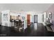 Contemporary kitchen with a large island, counter seating, stainless steel appliances, and modern fixtures at 3710 E Hazelwood St, Phoenix, AZ 85018