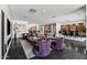 Spacious living room featuring modern design elements, open layout, and luxurious seating areas at 3710 E Hazelwood St, Phoenix, AZ 85018