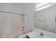 Bathroom features a tub, shower combination, white vanity, and tile flooring at 3900 S Velero St, Chandler, AZ 85249