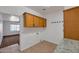 Functional laundry room with tile flooring, bright walls, and modern appliances at 3900 S Velero St, Chandler, AZ 85249