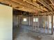 Open interior showcasing structural framework, windows, and renovation-ready space at 3948 E Monterosa St, Phoenix, AZ 85018