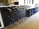 A display of golf clubs and bags at a club house or golf shop for players to purchase at 40215 N 110Th Pl, Scottsdale, AZ 85262
