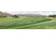 The golf course provides lush fairways surrounded by beautiful desert mountain and community views at 40215 N 110Th Pl, Scottsdale, AZ 85262