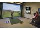 Residents can enjoy the golf simulator to improve their game, with viewing screens at 40215 N 110Th Pl, Scottsdale, AZ 85262