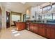 Well-equipped kitchen offers granite counters, modern appliances, and a breakfast nook with large window at 40215 N 110Th Pl, Scottsdale, AZ 85262