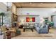 Bright and airy living room featuring a stone fireplace and comfortable seating at 40215 N 110Th Pl, Scottsdale, AZ 85262